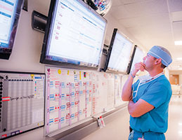 Photo of a medical professional. Link to Ronald K. Baker's story.