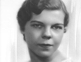 Photo of Adrienne Adam. Link to her story.